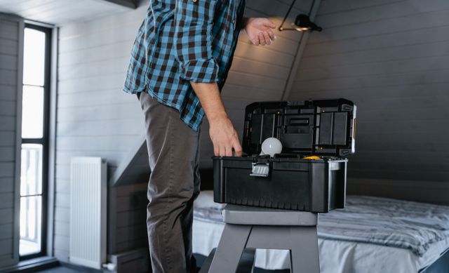 person%20on%20a%20ladder%20with%20a%20toolbox person%20on%20a%20ladder%20with%20a%20toolbox